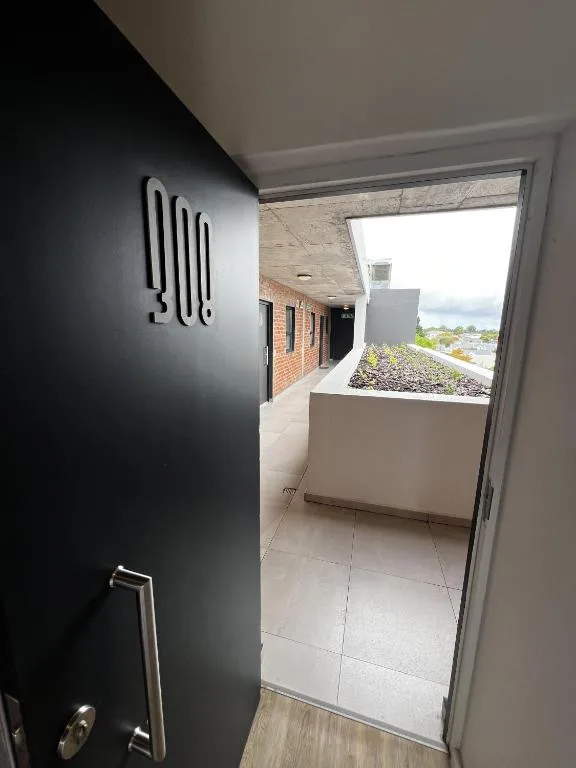 Modern patio with scenic mountain and lagoon views from the property