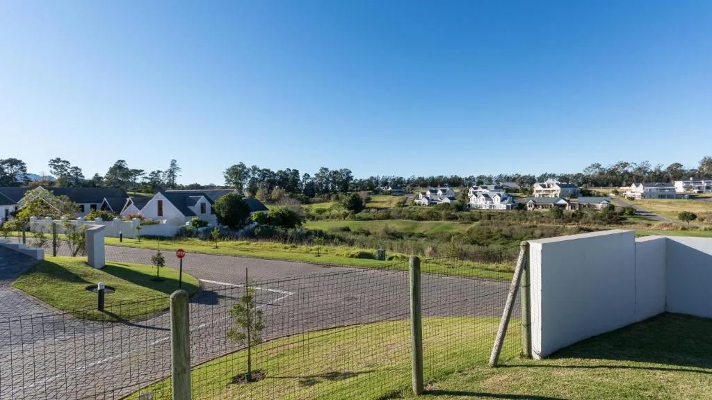 Scenic view of Kingswood Golf Estate with manicured gardens and distant homes