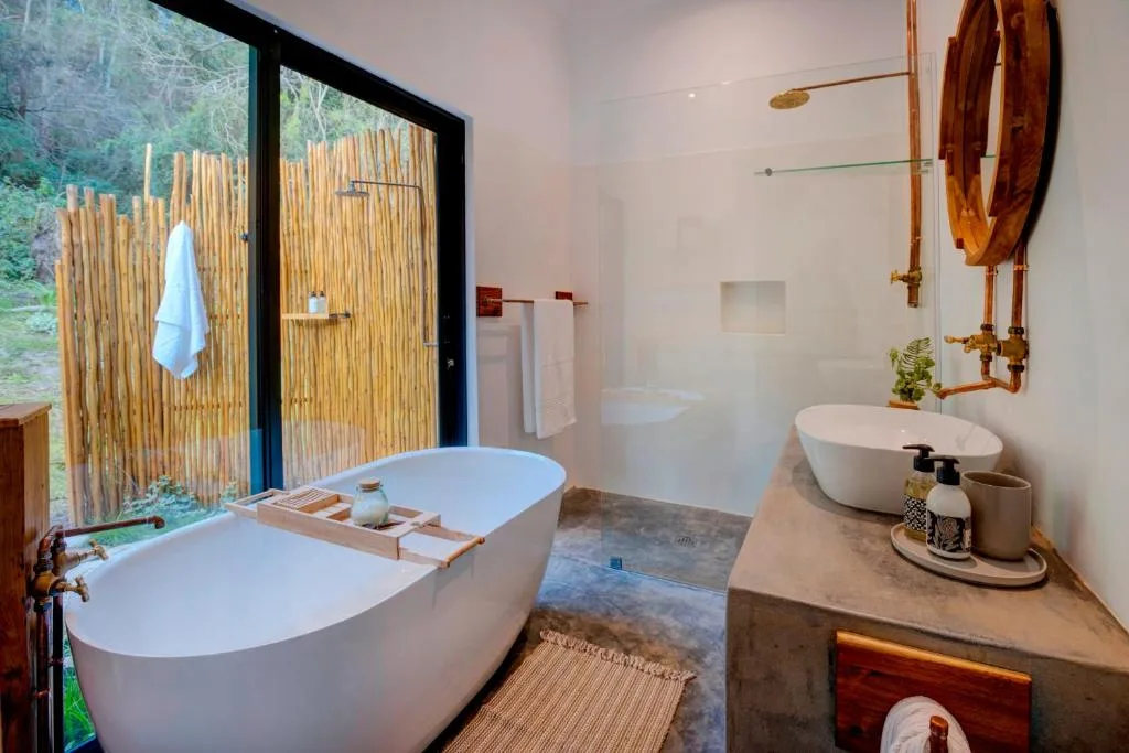 Luxurious bathroom with freestanding bathtub and wooden shower enclosure