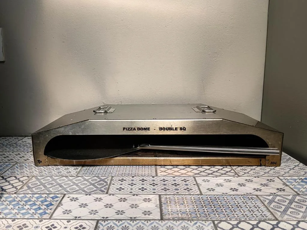 Pizza Dome Double SQ oven with stainless steel dome and black interior