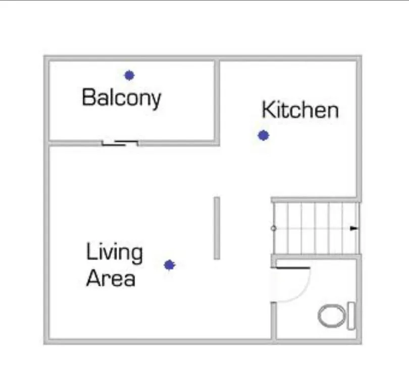 Floor plan showing balcony, kitchen, living area, and bathroom layout